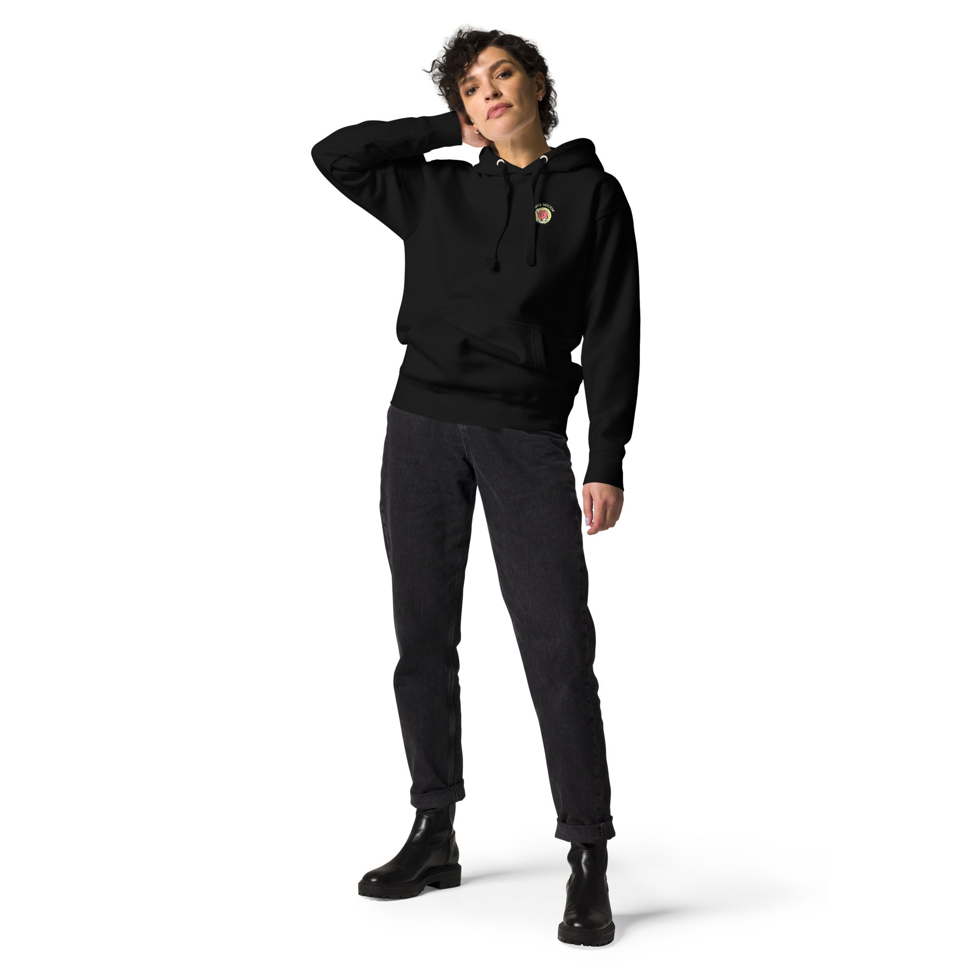 Model wearing black Juice Doctor unisex premium hoodie with small embroidered logo on chest. Casual, cozy streetwear for everyday comfort and brand pride.