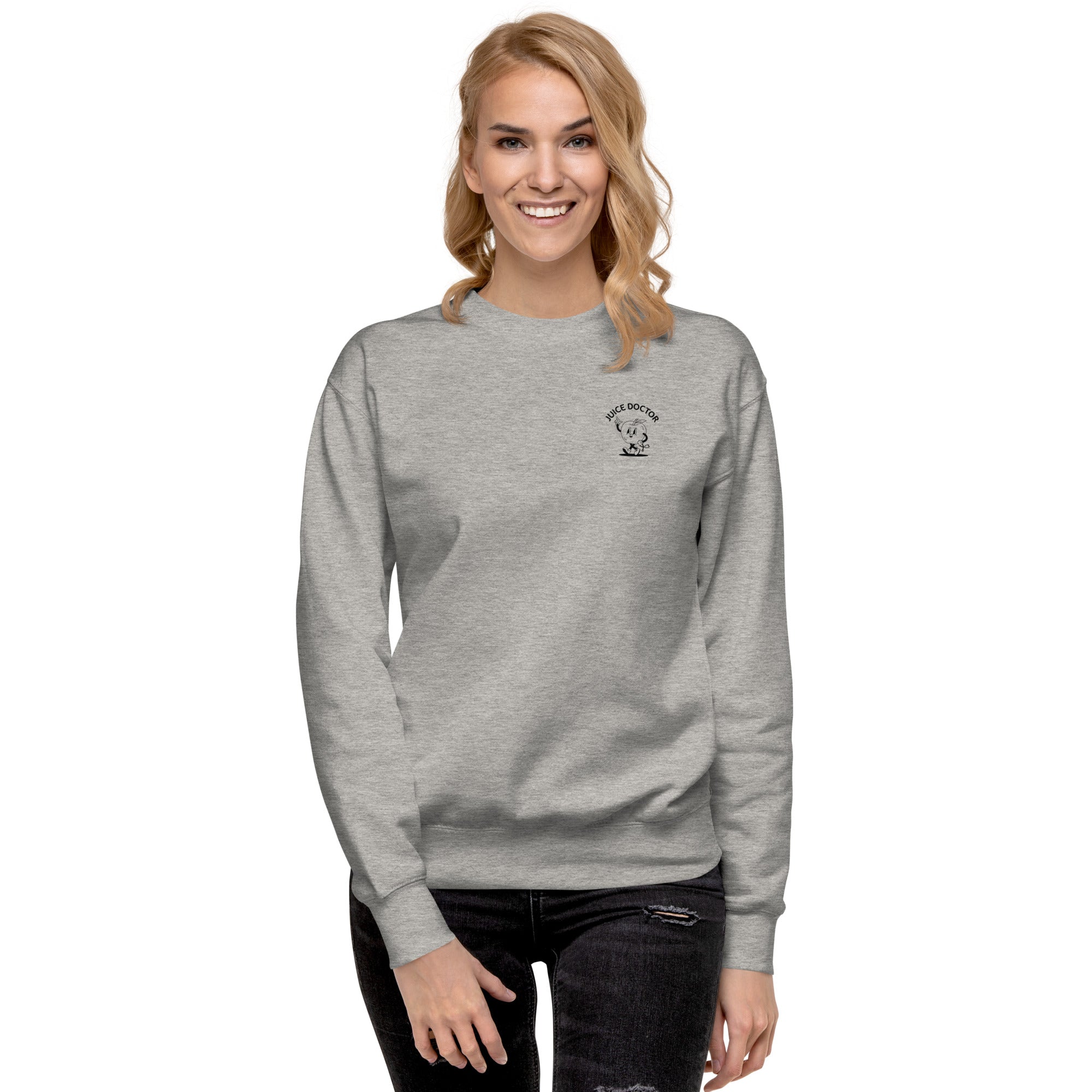 Model wearing a carbon grey Juice Doctor unisex premium sweatshirt with small black embroidered chest logo. Cozy, casual fit perfect for everyday wear.
